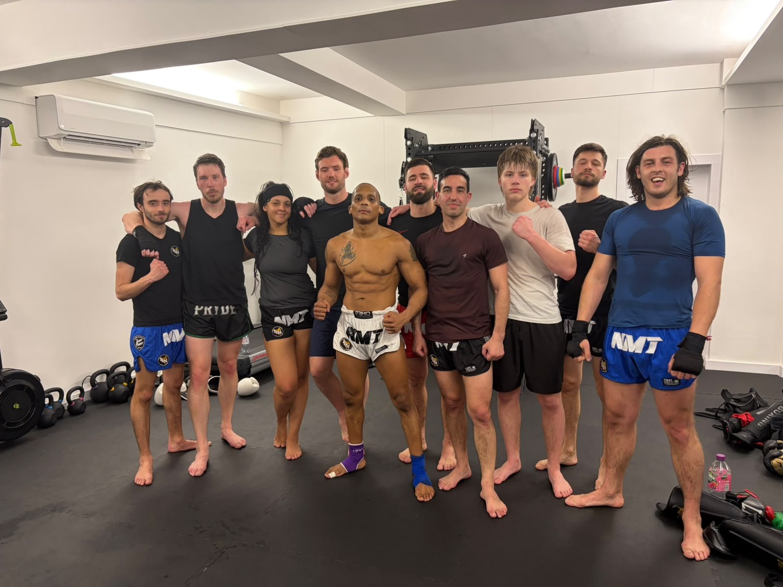 Nolan Muay Thai team in NMT fight shorts after a training session