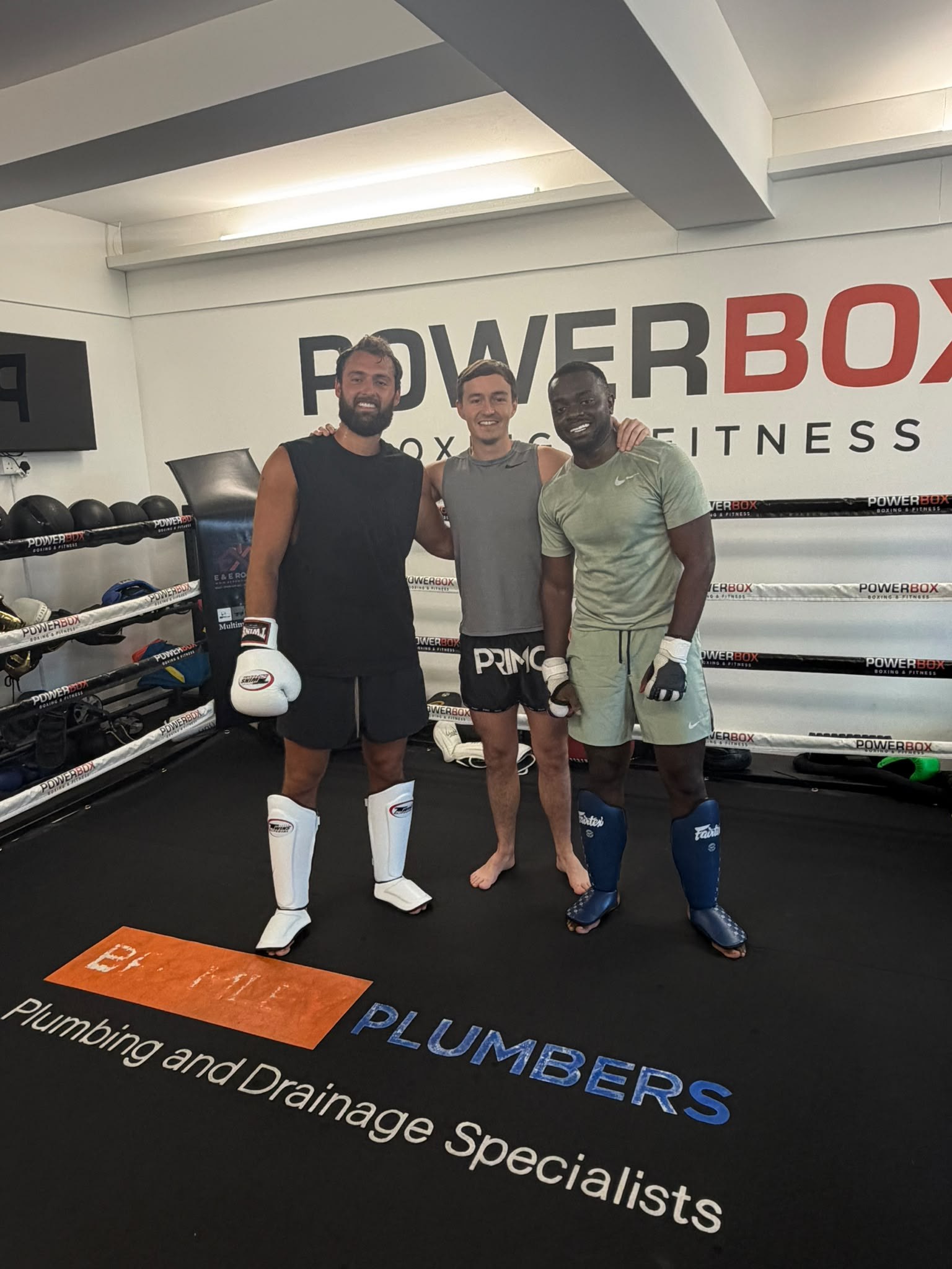 Three fighters after a Muay Thai sparring session at PowerBox Boxing & Fitness